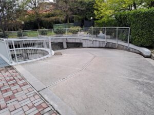 Access ramp leading to the secure private garage of The artist's Garden in Milano