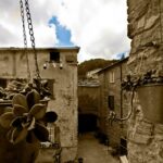 Stay Hamlet regenerative travel experience with a view of the historic Italian village Castè by Gianluca Ghinolfi -Regenerative Travel in Milan & Liguria